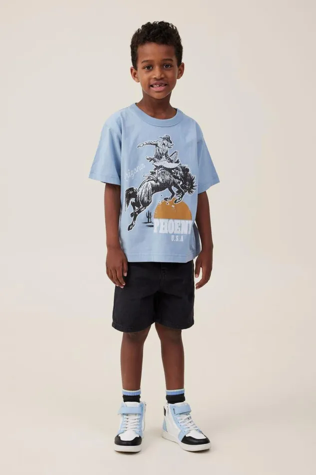 Jonny Short Sleeve Print Tee Dusty Bluephoenix Cowboy Boys Cotton On Tops and TShirts Jonny Short Sleeve Print Tee Dusty Bluephoenix Cowboy Boys Cotton On Tops and TShirts
