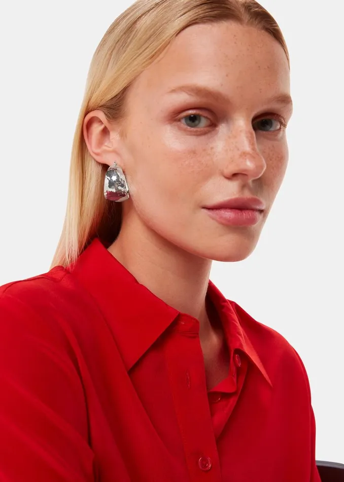 Women Jewellery Whistles Silver Textured Curved Earring
